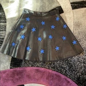 Black leather skirt with royal blue stars